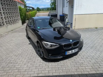 Gebraucht BMW 116 116 PS (85 kW) 2012 Schwarz Kleinwagen