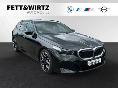 Gebraucht BMW i5 M Sport 442 kW (601 PS) 2024 Saphirschwarz metallic Kombi