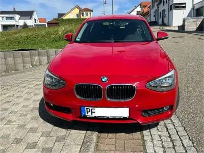 Gebraucht BMW 114 105 PS (77 kW) 2014 Rot Kleinwagen