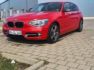 Gebraucht BMW 116 Sport Line 136 PS (100 kW) 2011 Rot Kleinwagen