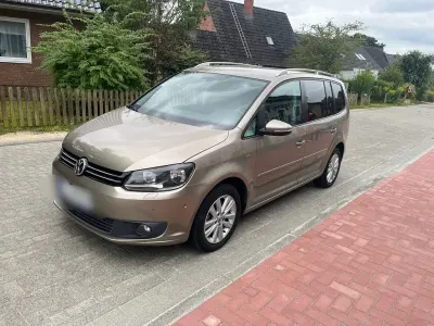 Gebraucht VW Touran Life 105 PS (77 kW) 2013 Braun Van / Kleinbus