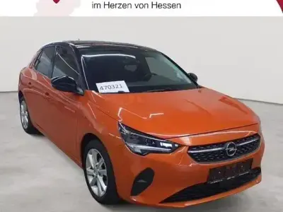 Gebraucht Opel Corsa Elegance 75 PS (55 kW) 2023 Dynamik orange metallic/dach karbon schwarz metallic Kleinwagen
