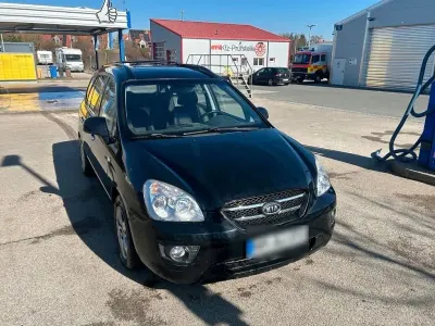 Używany Kia Carens EX 140 KM (102 kW) 2009 Czarny Minivan