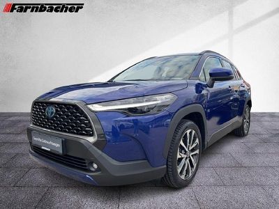 Gebraucht Toyota Corolla Cross Team 197 PS (144 kW) 2023 Nachtblau mica metallic SUV