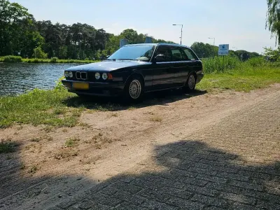 Gebraucht BMW 525 M Sport 192 PS (141 kW) 1994 Schwarz Kombi
