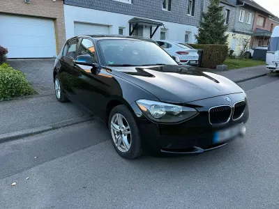 Second-hand BMW 114 102 CP (75 kW) 2014 Negru Hatchback
