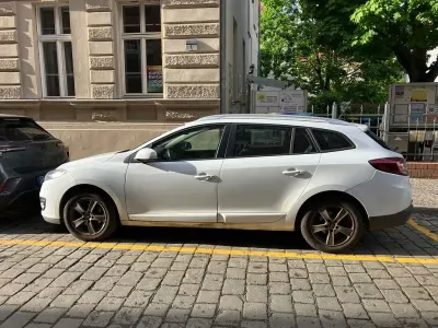 Używany Renault Mégane Initiale Paris 101 KM (74 kW) 2013 Biały Sedan/Limuzyna
