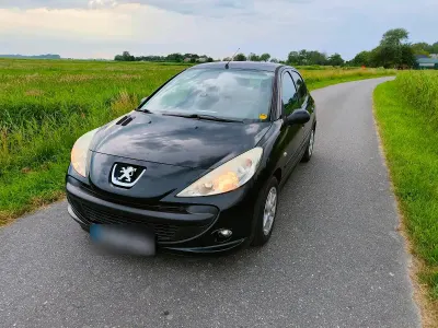 Gebraucht Peugeot 206+ 70 PS (51 kW) 2009 Schwarz Kleinwagen