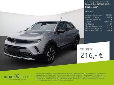 Gebraucht Opel Mokka-e Elegance 100 kW (136 PS) 2022 Kontrast grau/quarz silber SUV