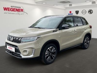 Gebraucht Suzuki Vitara Comfort+ 102 PS (75 kW) 2023 Savannah/cosmic black pearl meta SUV
