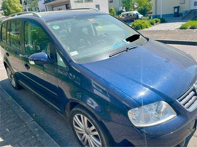 Second-hand VW Touran 150 CP (110 kW) 2006 Albastru Monovolum