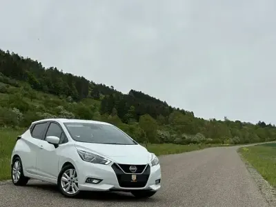 Gebraucht Nissan Micra Acenta 101 PS (74 kW) 2020 Weiß Kleinwagen