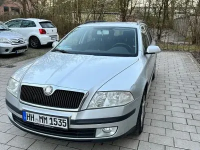 Używany Skoda Octavia Ambiente 105 KM (77 kW) 2007 Srebrny Kombi