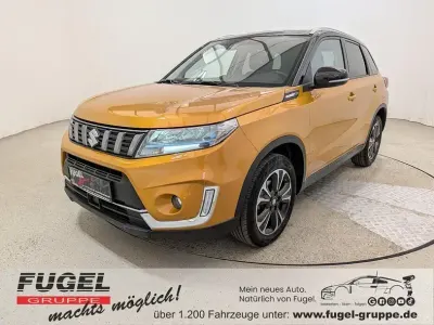 Gebraucht Suzuki Vitara Comfort+ 129 PS (94 kW) 2023 Solar yellow / cosmic black SUV