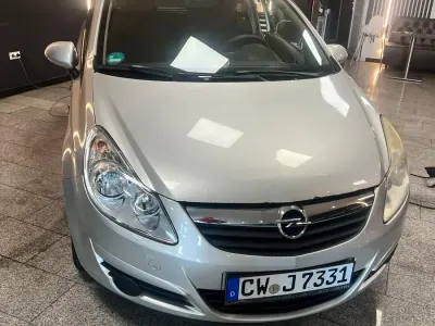 Używany Opel Corsa 80 KM (58 kW) 2009 Srebrny Hatchback