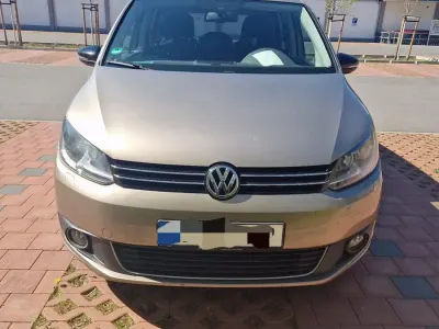 Gebraucht VW Touran 105 PS (77 kW) 2012 Gold Van / Kleinbus