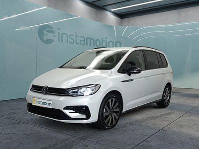 Second-hand VW Touran Pro 150 CP (110 kW) 2024 Alb Monovolum