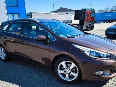 Gebraucht Kia Ceed Sportswagon 128 PS (94 kW) 2013 Braun Kombi