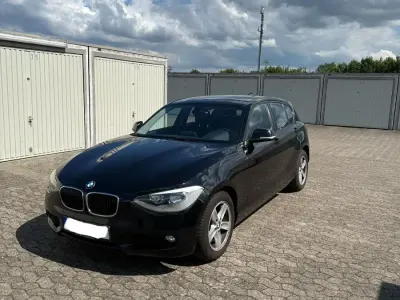 Gebraucht BMW 114 102 PS (75 kW) 2012 Schwarz Kleinwagen