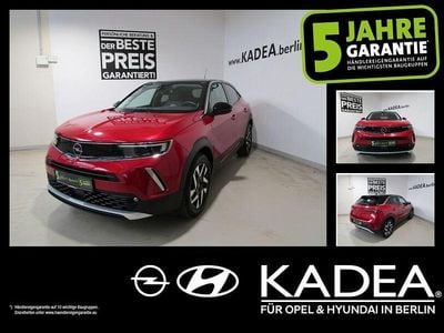 Gebraucht Opel Mokka-e 100 kW (136 PS) 2023 Lackierung rot rubi/typ aussenverkleidun (metallic) SUV