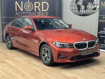 Gebraucht BMW 318 Advantage 150 PS (110 kW) 2021 Sunset orange metalli (metallic) Limousine