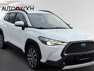 Gebraucht Toyota Corolla Cross Team 197 PS (144 kW) 2022 Platinumweiß perleffekt SUV