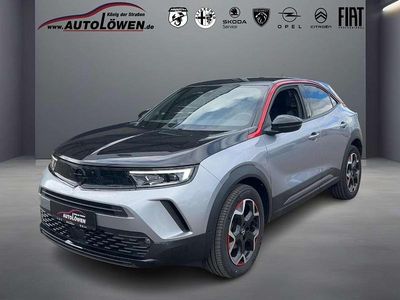 Gebraucht Opel Mokka GS Line 110 PS (80 kW) 2022 Tiefquarz grau/quarz silber SUV