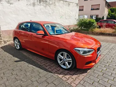Gebraucht BMW 114 M Sport 102 PS (75 kW) 2012 Orange Kleinwagen