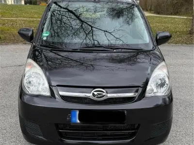 Gebraucht Daihatsu Cuore 69 PS (50 kW) 2009 Schwarz Kleinwagen