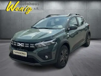 Neu Dacia Sandero Stepway 91 PS (66 kW) 2025 Safarigrüngrau Limousine