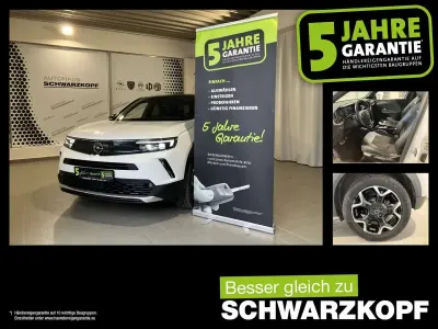 Gebraucht Opel Mokka-e 100 kW (136 PS) 2022 Jade weiss/arktis weiss SUV