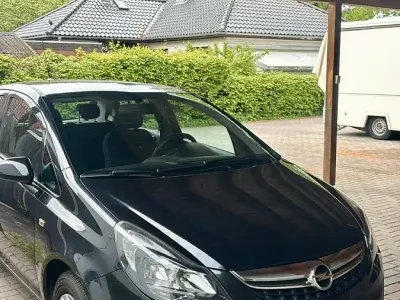 Gebraucht Opel Corsa 75 PS (55 kW) 2013 Schwarz Kleinwagen