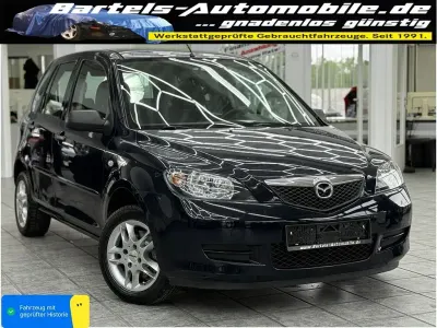 Używany Mazda 2 Comfort 75 KM (55 kW) 2004 Czarny Hatchback