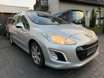 Gebraucht Peugeot 308 SW 114 PS (83 kW) 2013 Silber Kombi