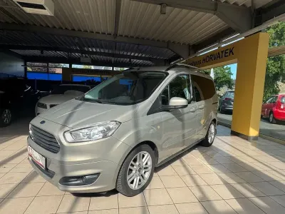 Gebraucht Ford Tourneo Courier 101 PS (74 kW) 2014 Silber Van / Kleinbus