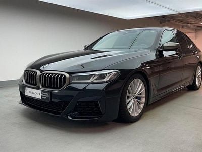 Gebraucht BMW M550 Efficient Dynamics 530 PS (389 kW) 2023 Saphirschwarz metallic Limousine