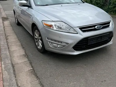 Używany Ford Mondeo 116 KM (85 kW) 2013 Srebrny Kombi