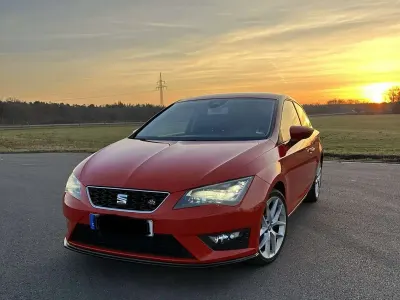 Używany Seat Leon SC FR 179 KM (131 kW) 2013 Czerwony Hatchback