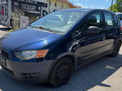 Gebraucht Mitsubishi Colt Edition 95 PS (69 kW) 2011 Tansanitblau (p) Kleinwagen