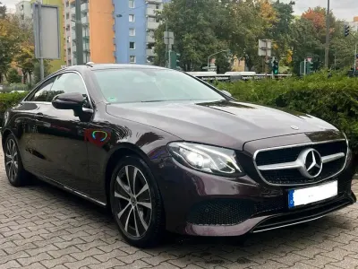 Używany Mercedes E220 194 KM (142 kW) 2019 Purpurowy Coupe