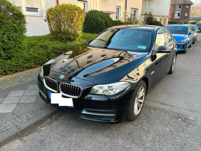 Używany BMW 518 143 KM (105 kW) 2014 Czarny Sedan/Limuzyna