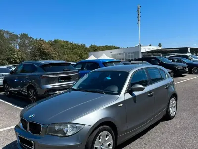 Gebraucht BMW 116 122 PS (89 kW) 2009 Grau Kleinwagen