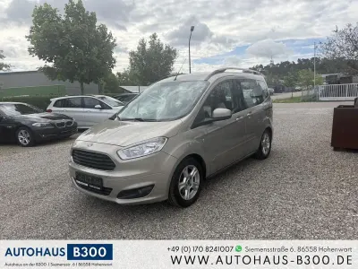 Używany Ford Tourneo Courier Trend 101 KM (74 kW) 2015 Szary Minivan