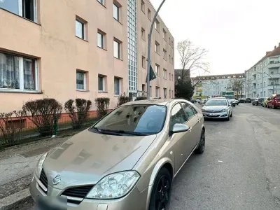Brugt Nissan Primera 116 HK (85 kW) 2003 Guld Sedan