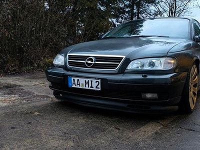 Second-hand Opel Omega 211 CP (155 kW) 2000 Negru Berlinǎ