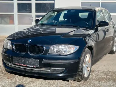 Gebraucht BMW 116 122 PS (89 kW) 2009 Schwarz Kleinwagen