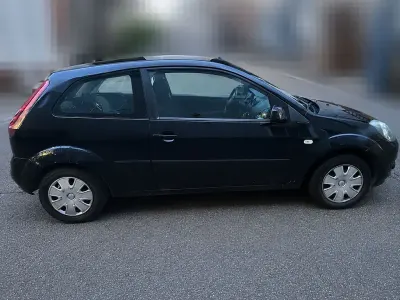 Gebraucht Ford Fiesta Ambiente 60 PS (44 kW) 2008 Schwarz Kleinwagen