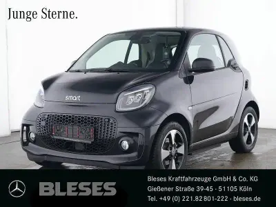 Gebraucht Smart ForTwo Coupé Exclusive 60 kW (82 PS) 2024 Bodypanels in black Kleinwagen