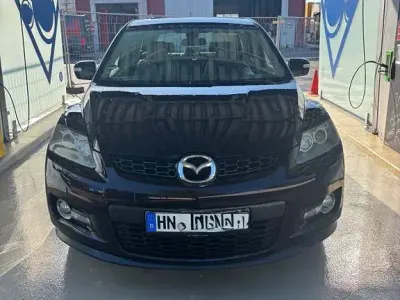 Używany Mazda CX-7 260 KM (191 kW) 2008 Purpurowy SUV