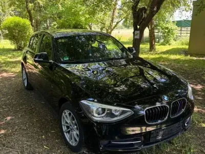 Gebraucht BMW 116 Sport Line 136 PS (100 kW) 2014 Schwarz Kleinwagen